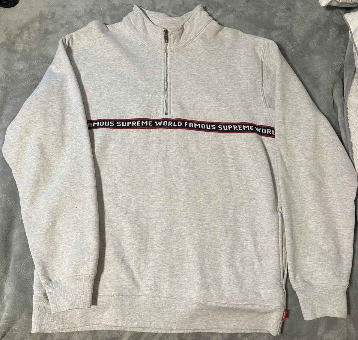 Supreme — Supreme World Famous Quarter Zip — streetwear — resale